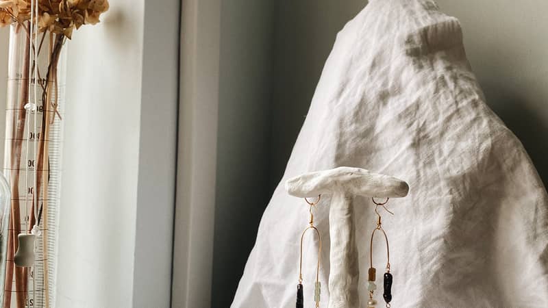 Studio shot of asymmetrical semi precious stone Edaisyt earrings