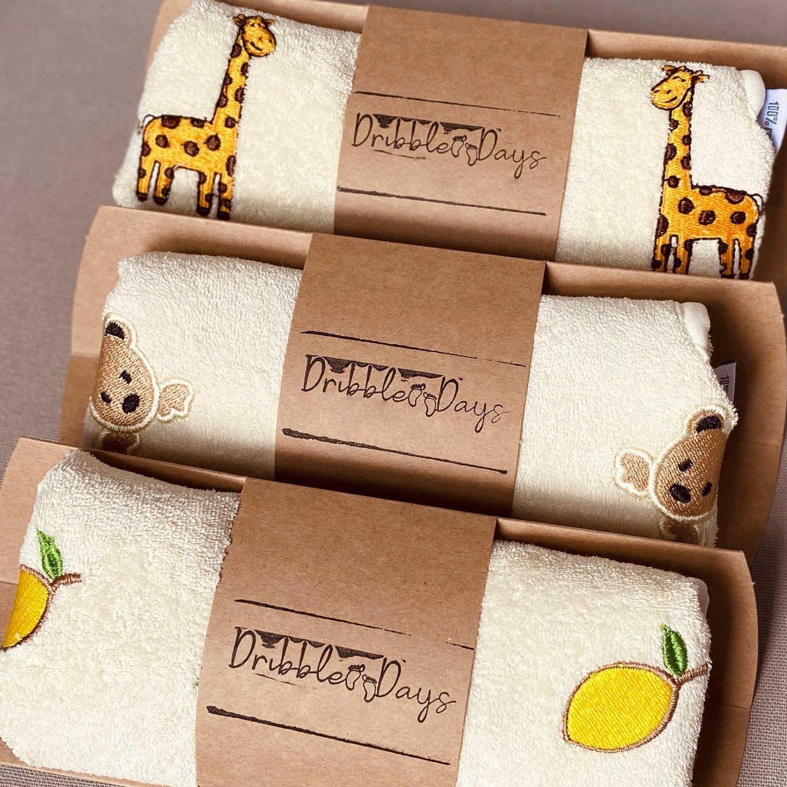Dribble Days baby bibs wrapped in packaging