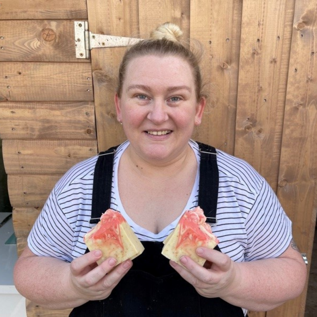 image of christine holding soap bars