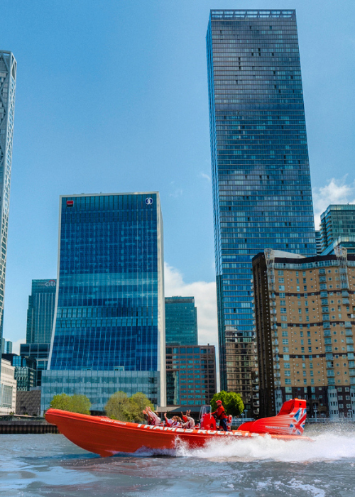 Thames Rockets London speedboat on the river Thames speeding around Canary Wharf. Fun things to do in London