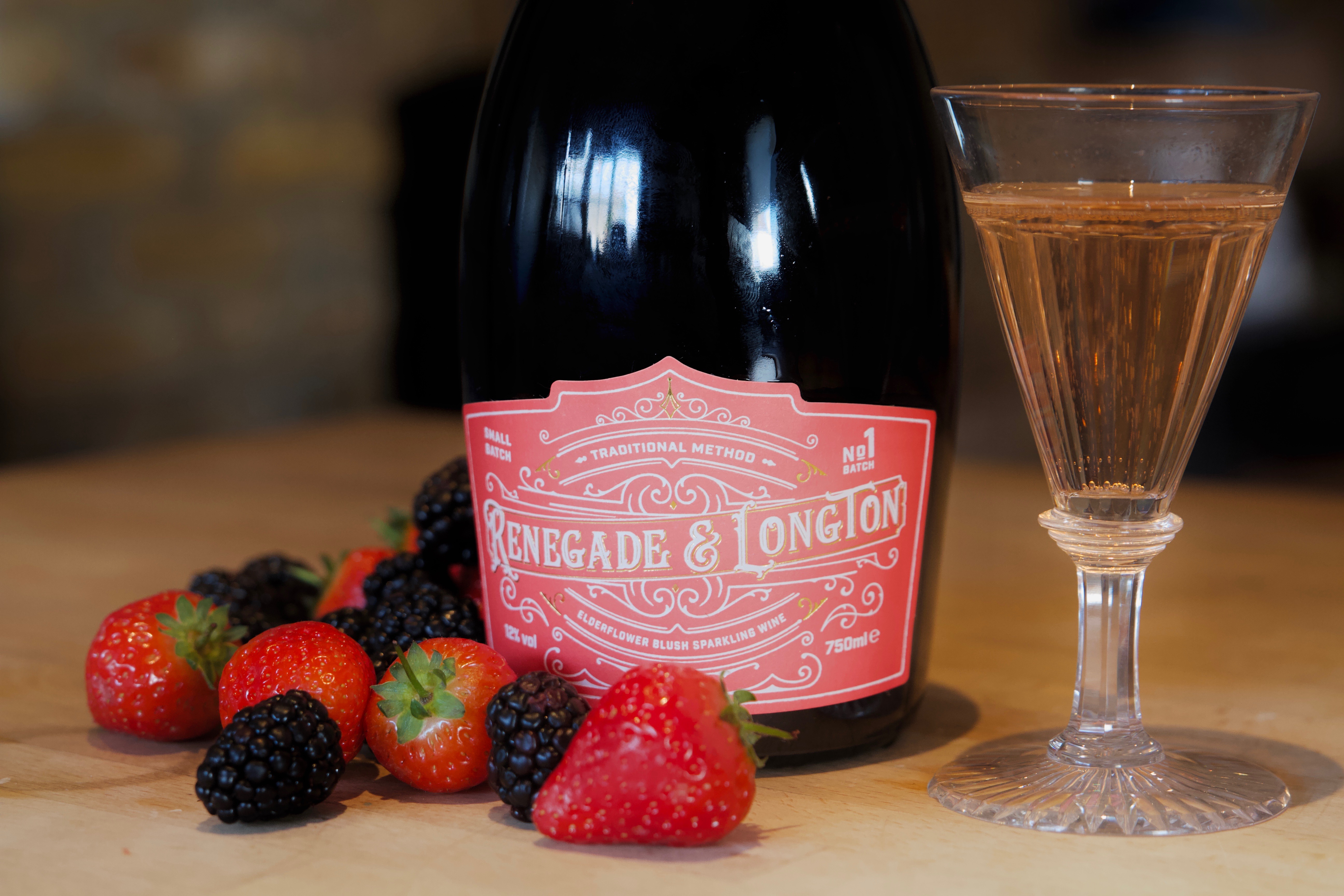 Blush bottle with berries