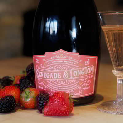 Blush bottle with berries