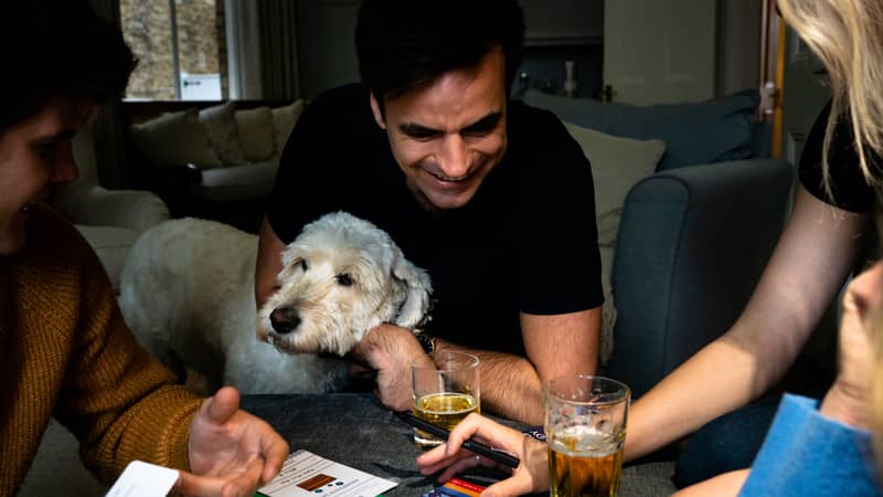 Boy and Dog playing puzzle