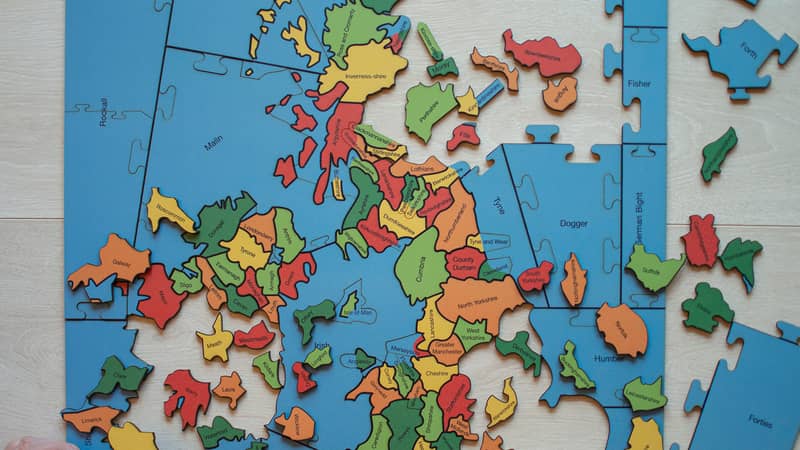 A partially made Counties of the British Isles Jigsaw Puzzle, with the sea cut into Sea areas.