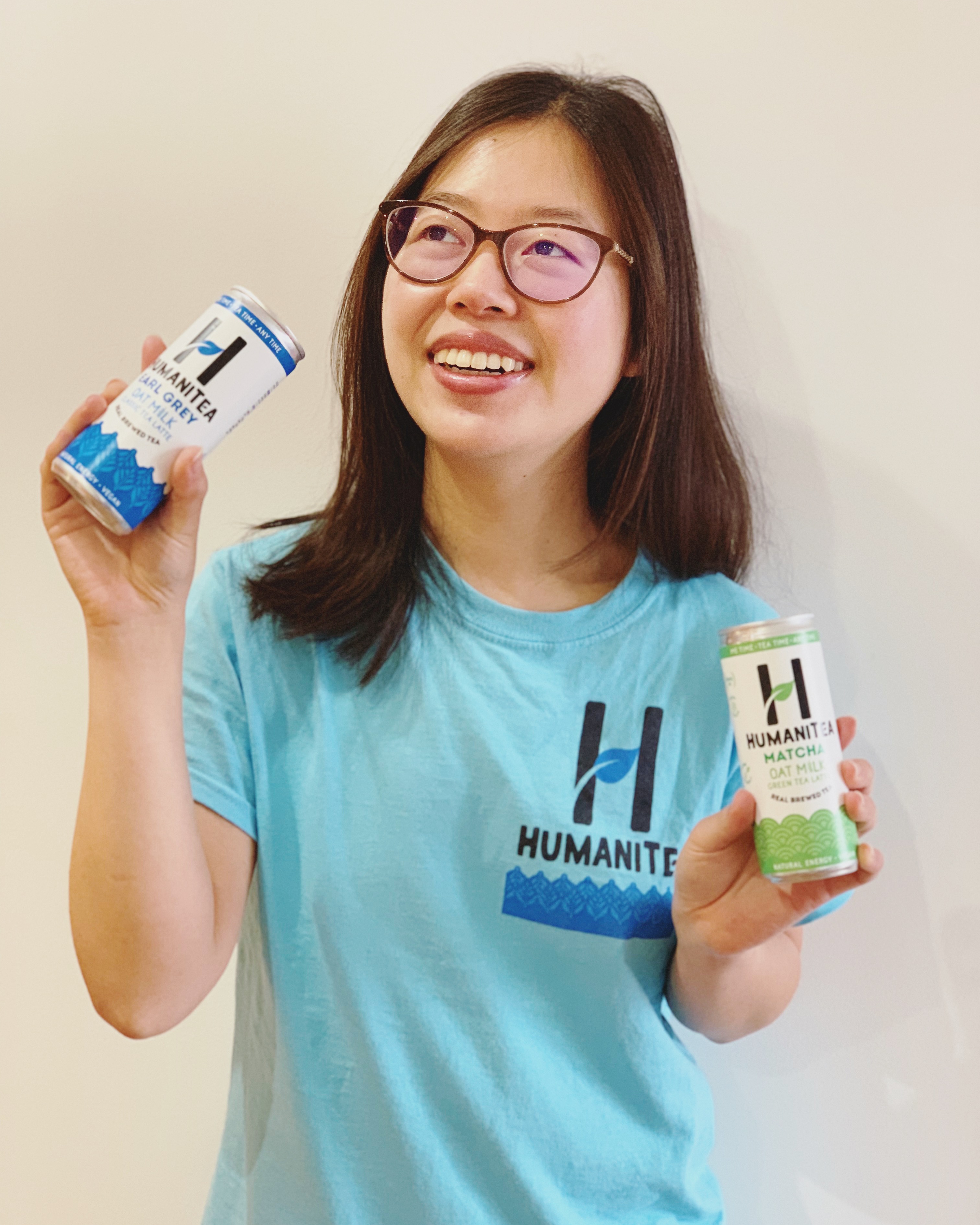 Tina Chief Tea Officer holding HumaniTea