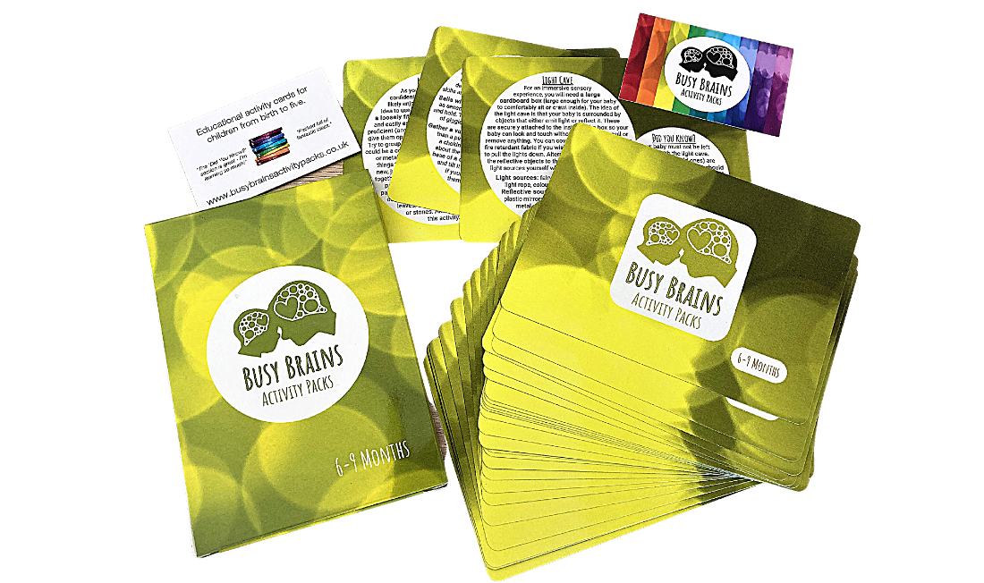 A 6-9 months pack removed from box and fanned out on table 