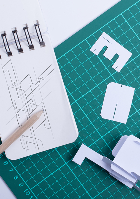 A sketch and prototype model of a paper craft Dinosaur 