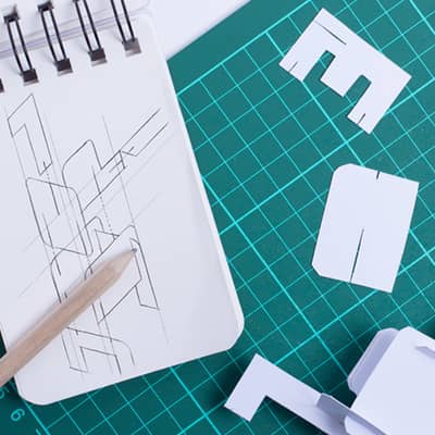 A sketch and prototype model of a paper craft Dinosaur