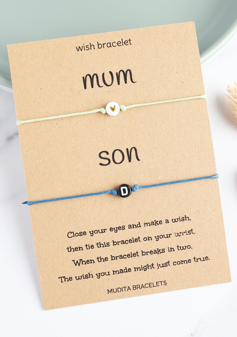 initial wish bracelets on a mum and son backing card