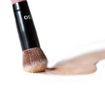 1.1 Domed Foundation brush dipped in foundation