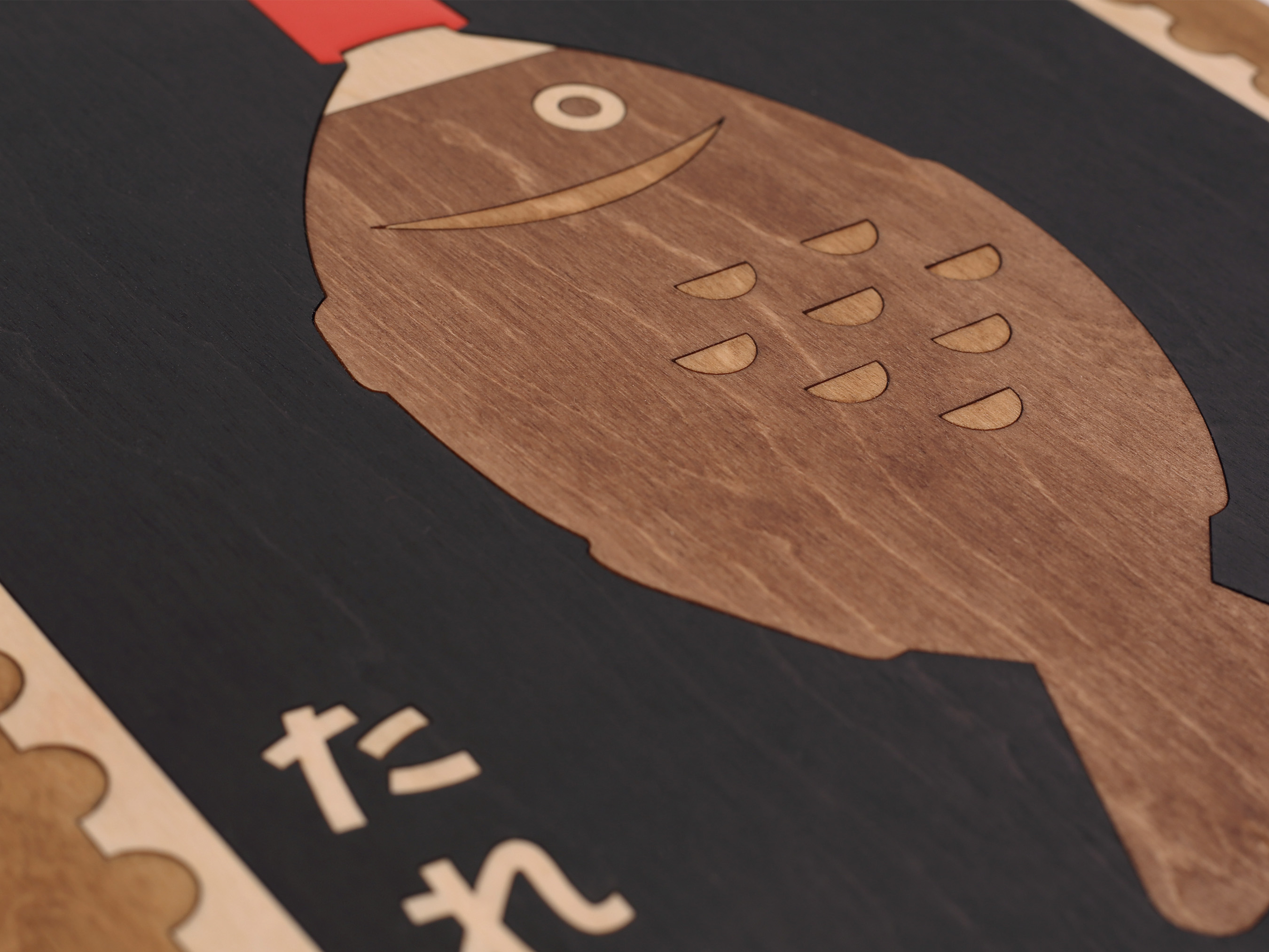 Close up of wooden wall art by snork of inspirational typographic poster reading freedom, knowledge, power