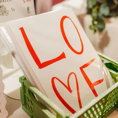 A poster with the words LOVE in capital letters