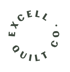 Excell Quilt Co. logo