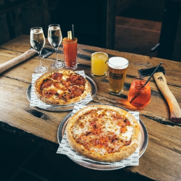 Pizza, drinks, and axes