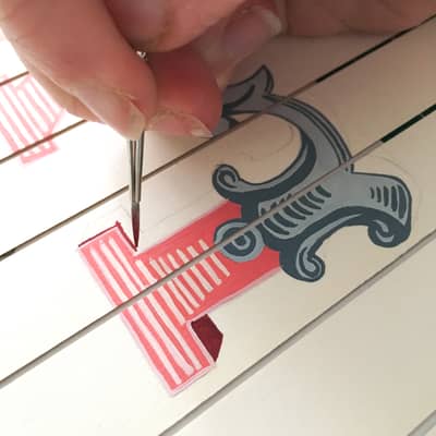 Hand painting a bespoke piece.