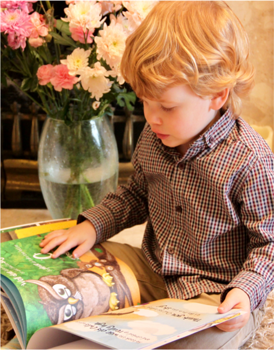 Nicoles brother Luke enjoying his book