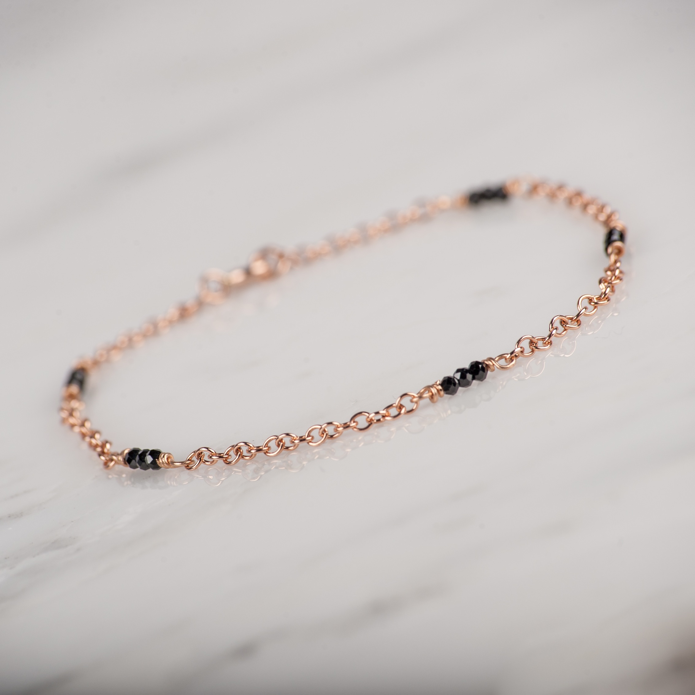 Black Spinels in 9ct Rose Gold Bracelet