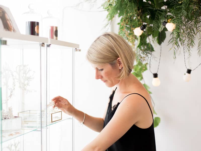 Victoria arranging her collection