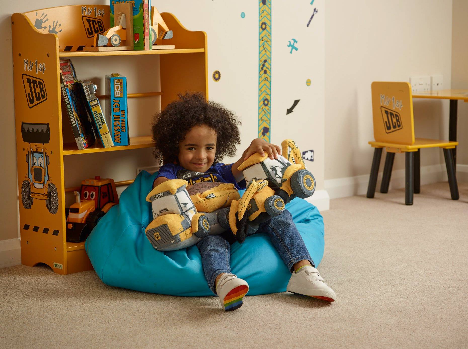 Snuggle up with some JCB soft toys!