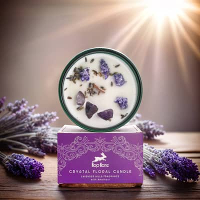 Lavender-scented floral candle with gemstones and real flowers in a glass jar with purple packaging.
