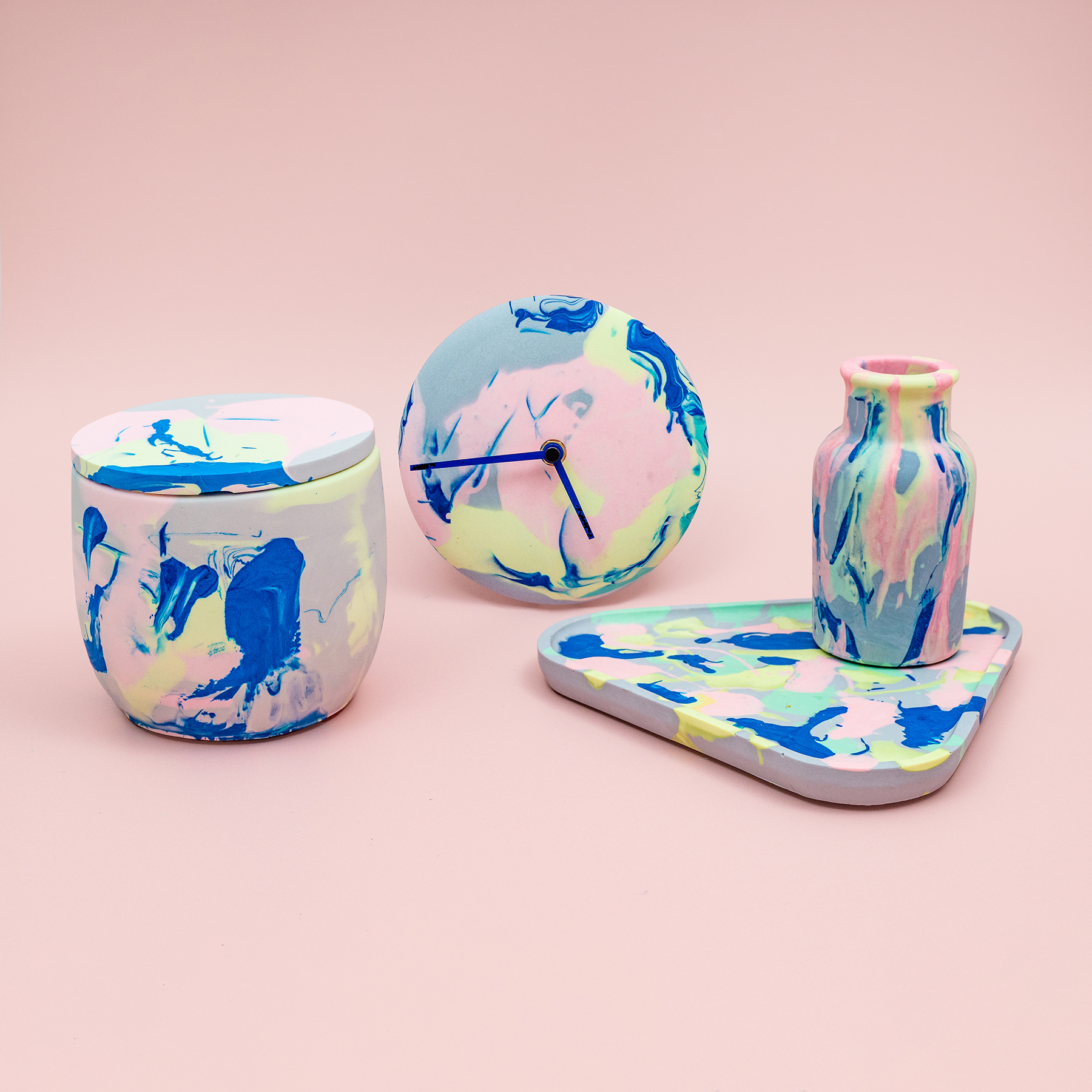 Jesmonite pot, wall clock and vase and tray set.