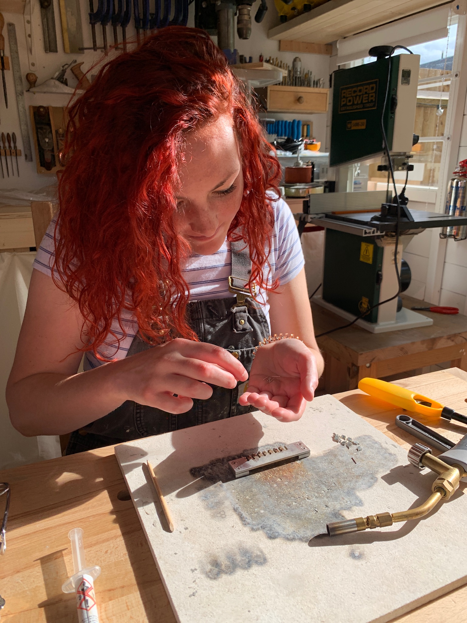 Handmade Earrings being Soldered.