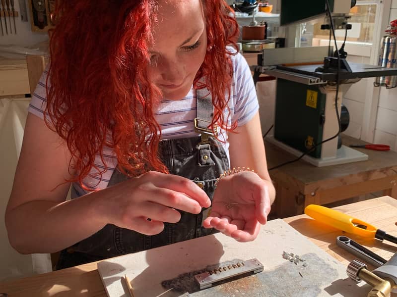 Handmade Earrings being Soldered.
