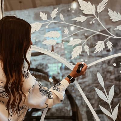 Laura painting mural