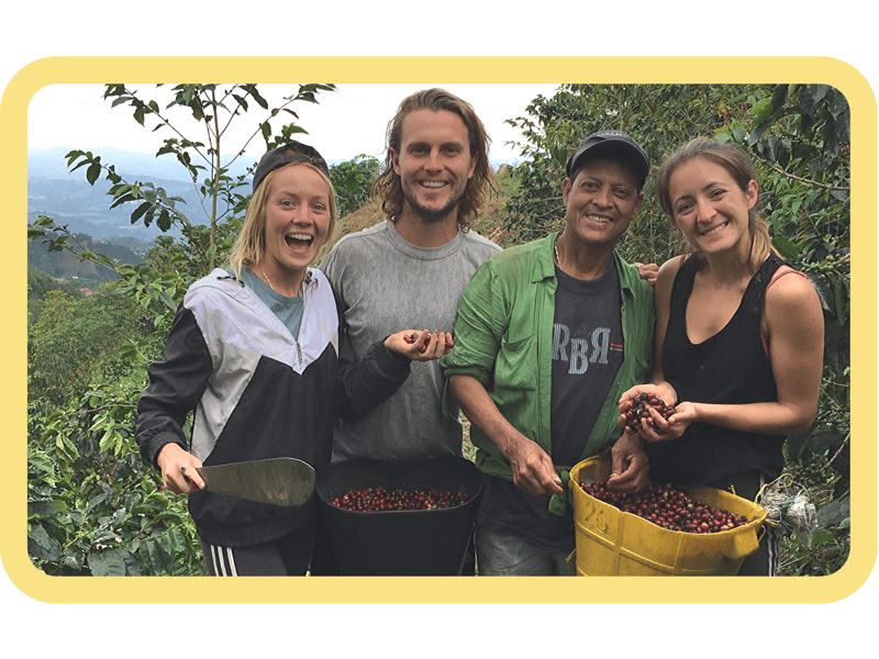 Laura and Tom in Colombia working on a coffee farm
