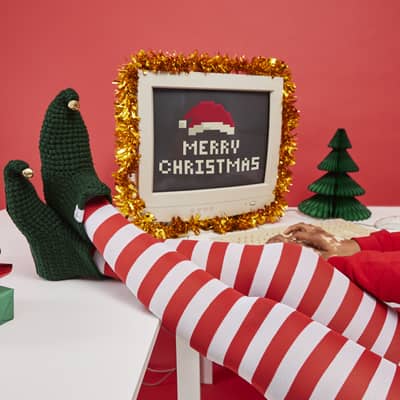 Stripy legs up on table