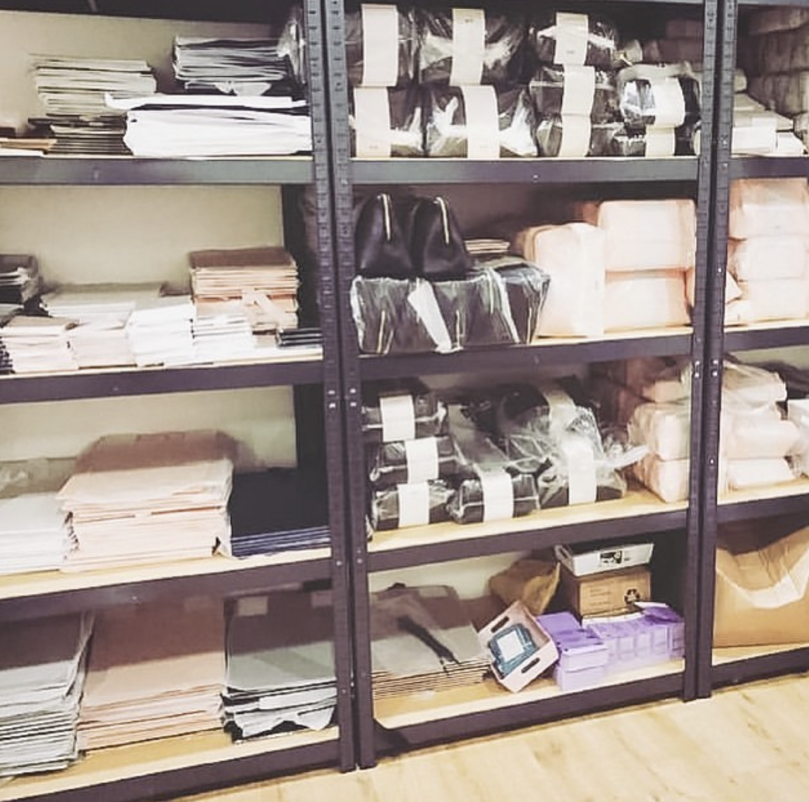 A photo of our shelves in our studio space