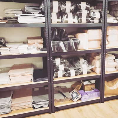 A photo of our shelves in our studio space