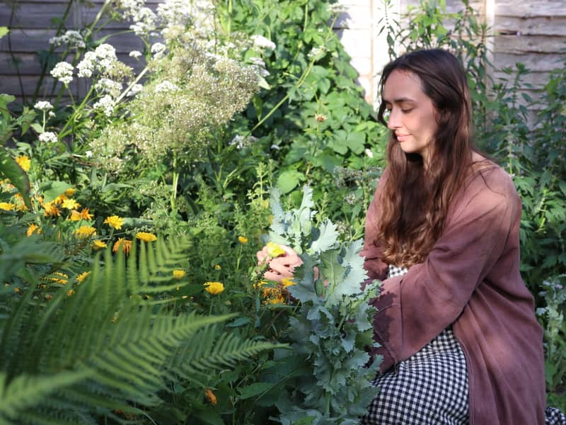 Salix Moon in her herb garden