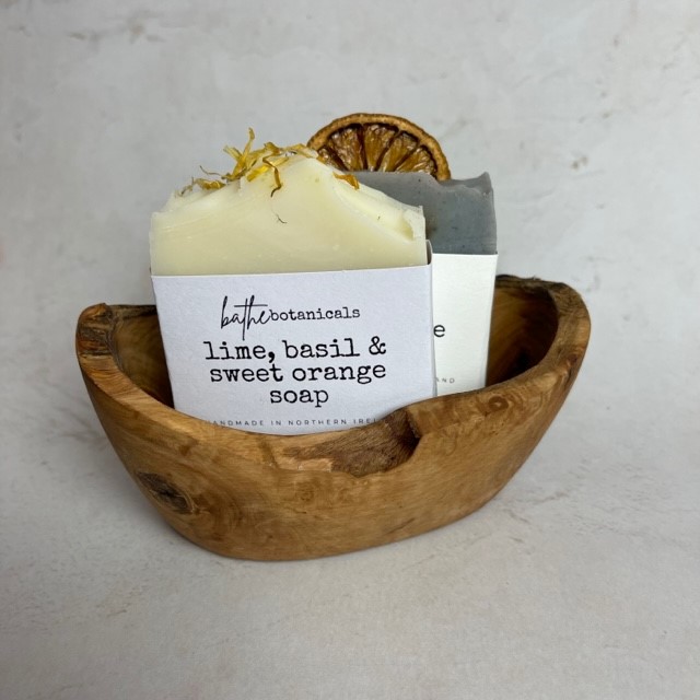 soap bars inside olive soap dish