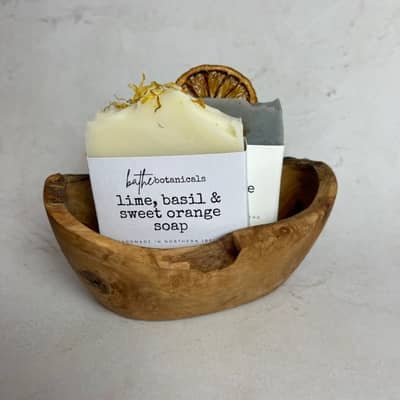 soap bars inside olive soap dish