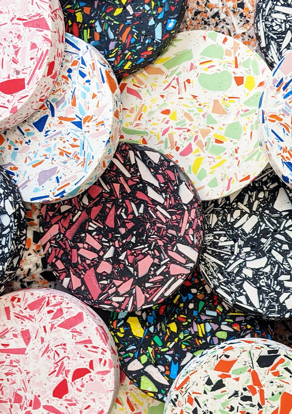 Collection of colourful circular terrazzo coasters