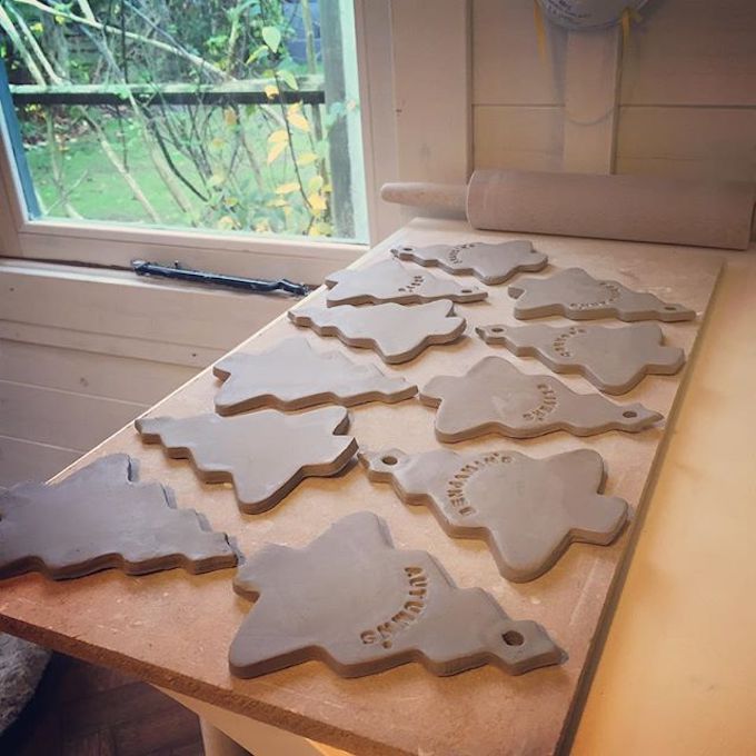 personally hand-stamping Christmas orders