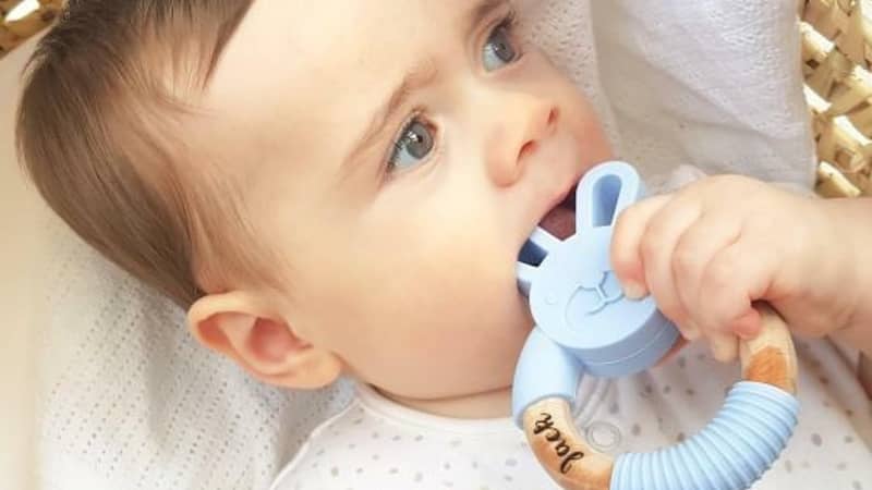 Jack with his personalised Teething toy. Silicone personalised teething bunny.