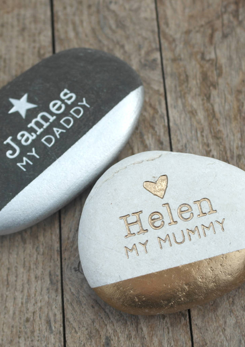 God and silver dipped pebble