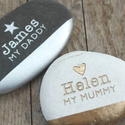 God and silver dipped pebble