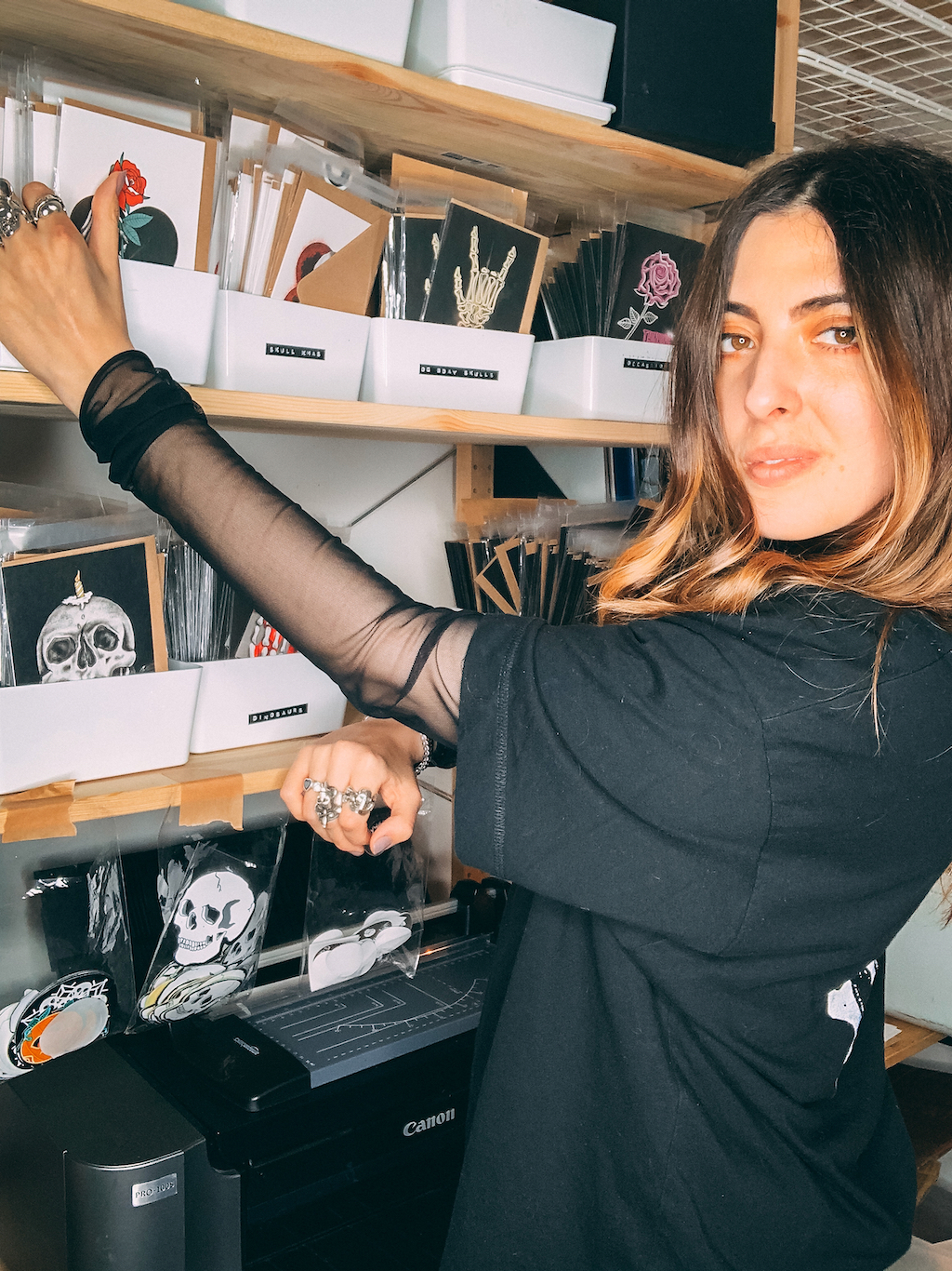 Emma sorting cards in the studio