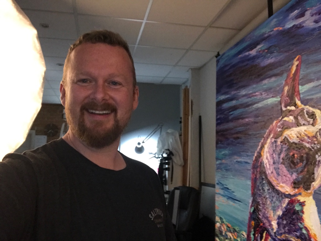 In the studio painting