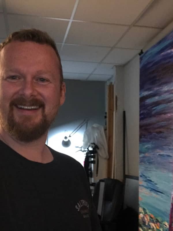 In the studio painting