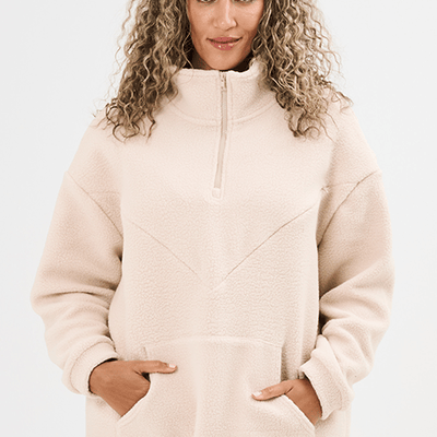 Mother breastfeeding their baby