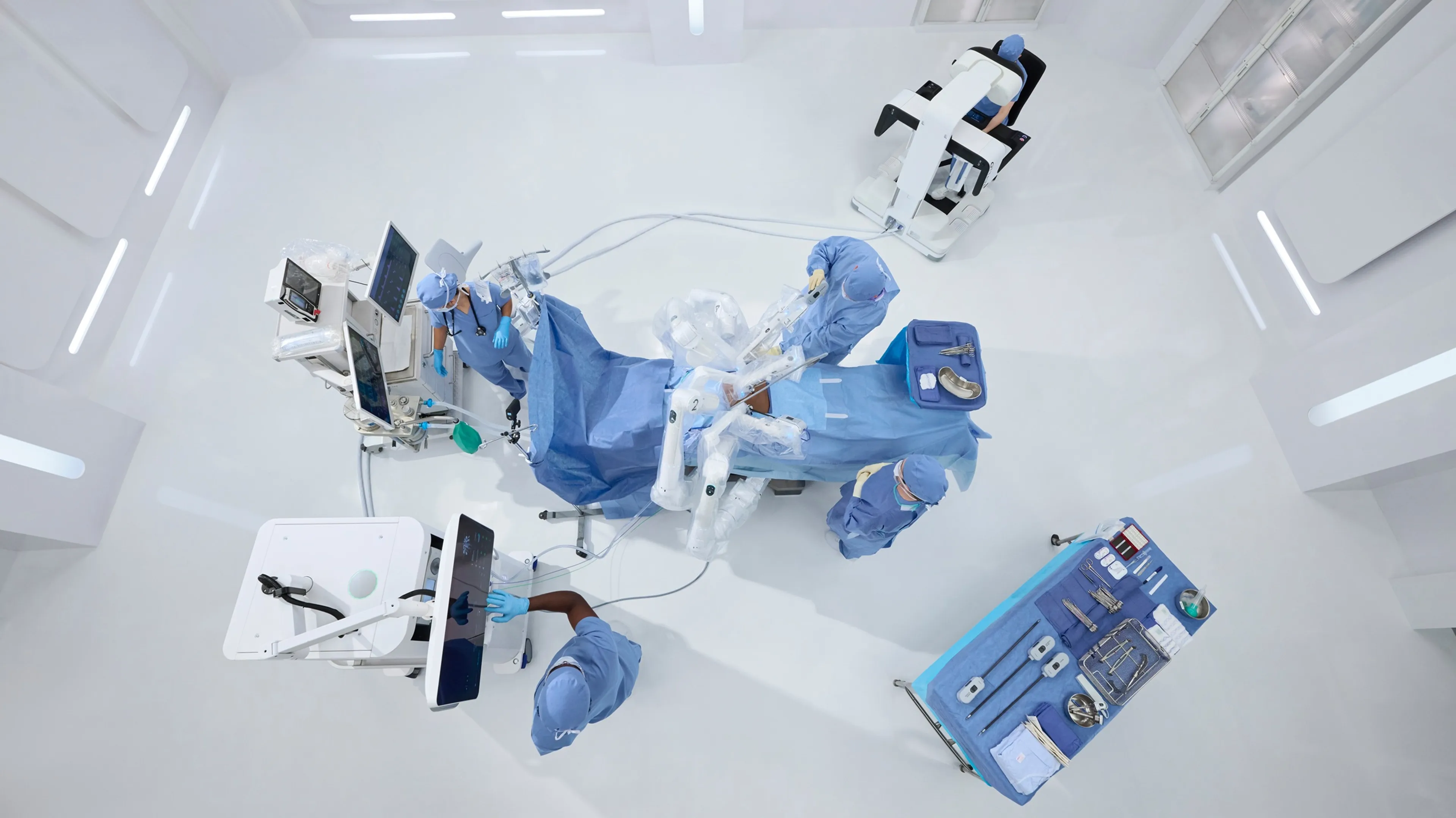 Bird’s eye view of the OTTAVA Robotic Surgical System in an operating room