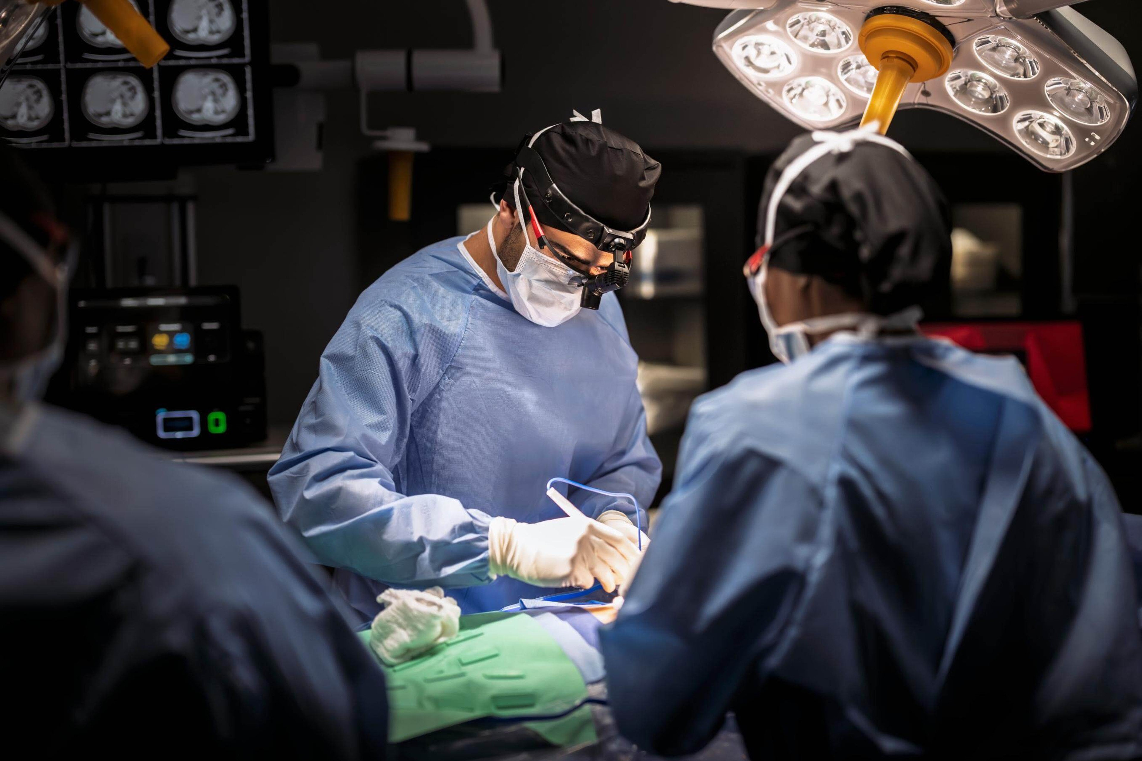 Surgery being performed in an operating room