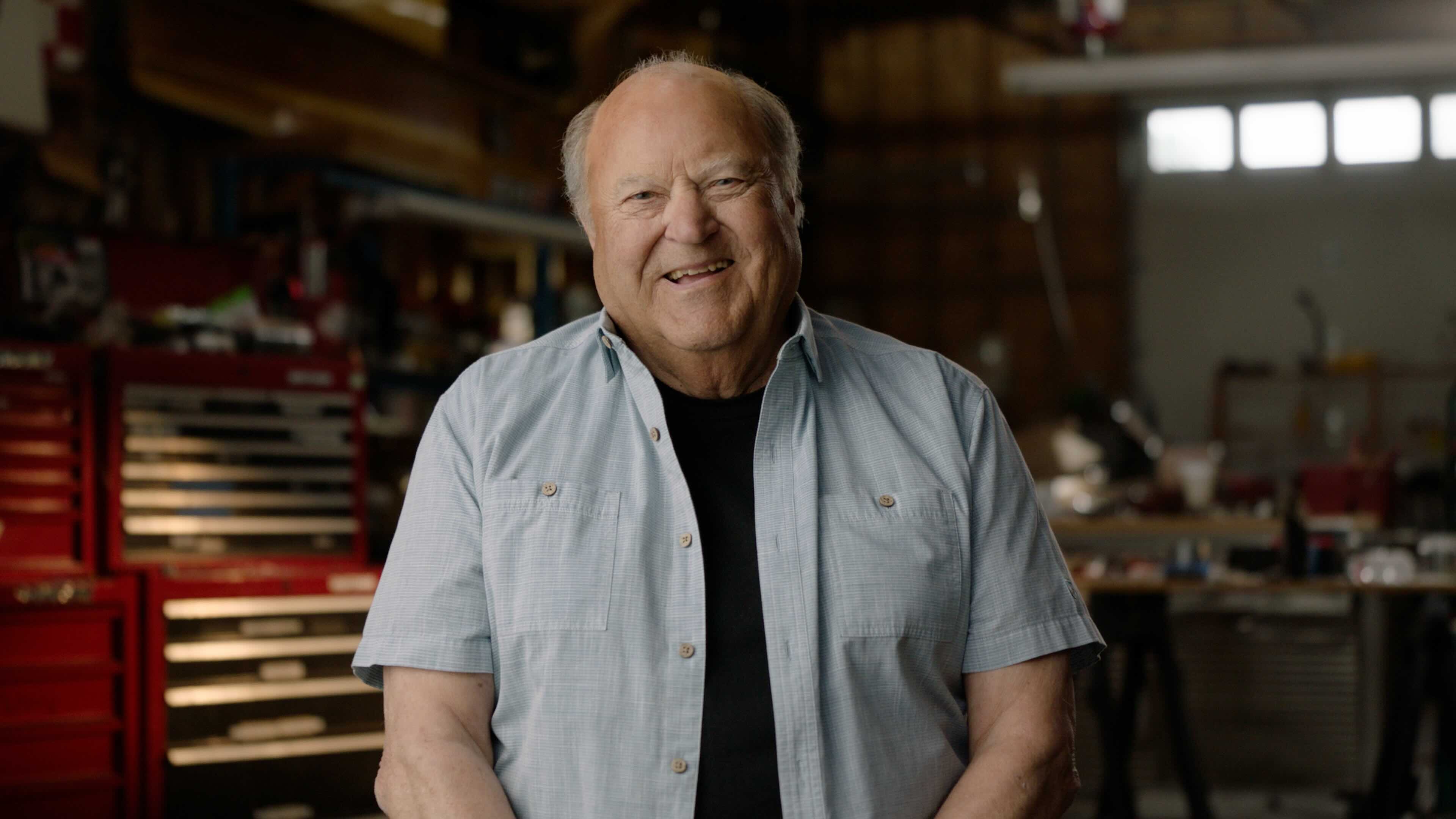 John Adams, co-founder of Shockwave Medical and inventor of IVL, standing in his home workshop. 