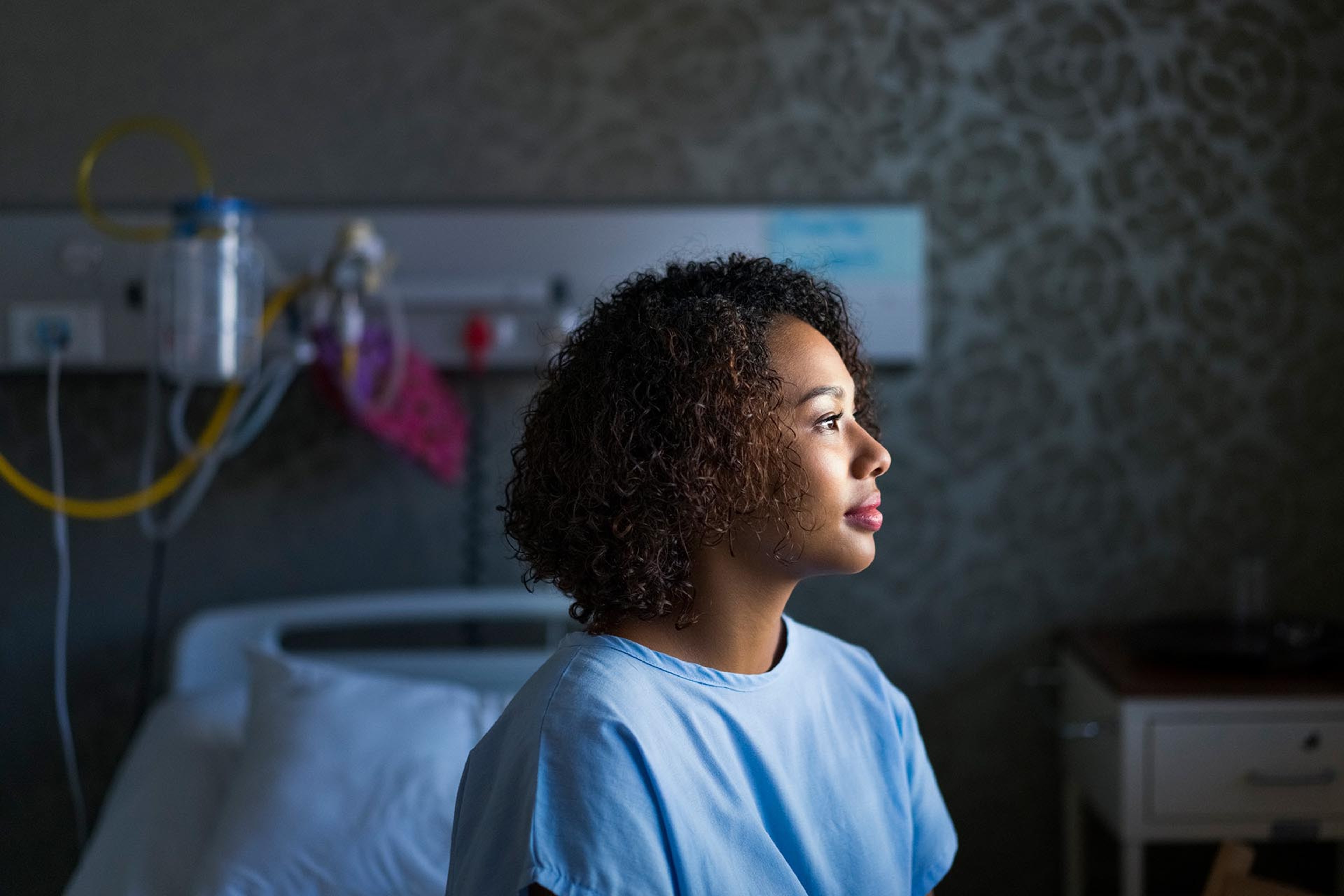 Woman in hospital room