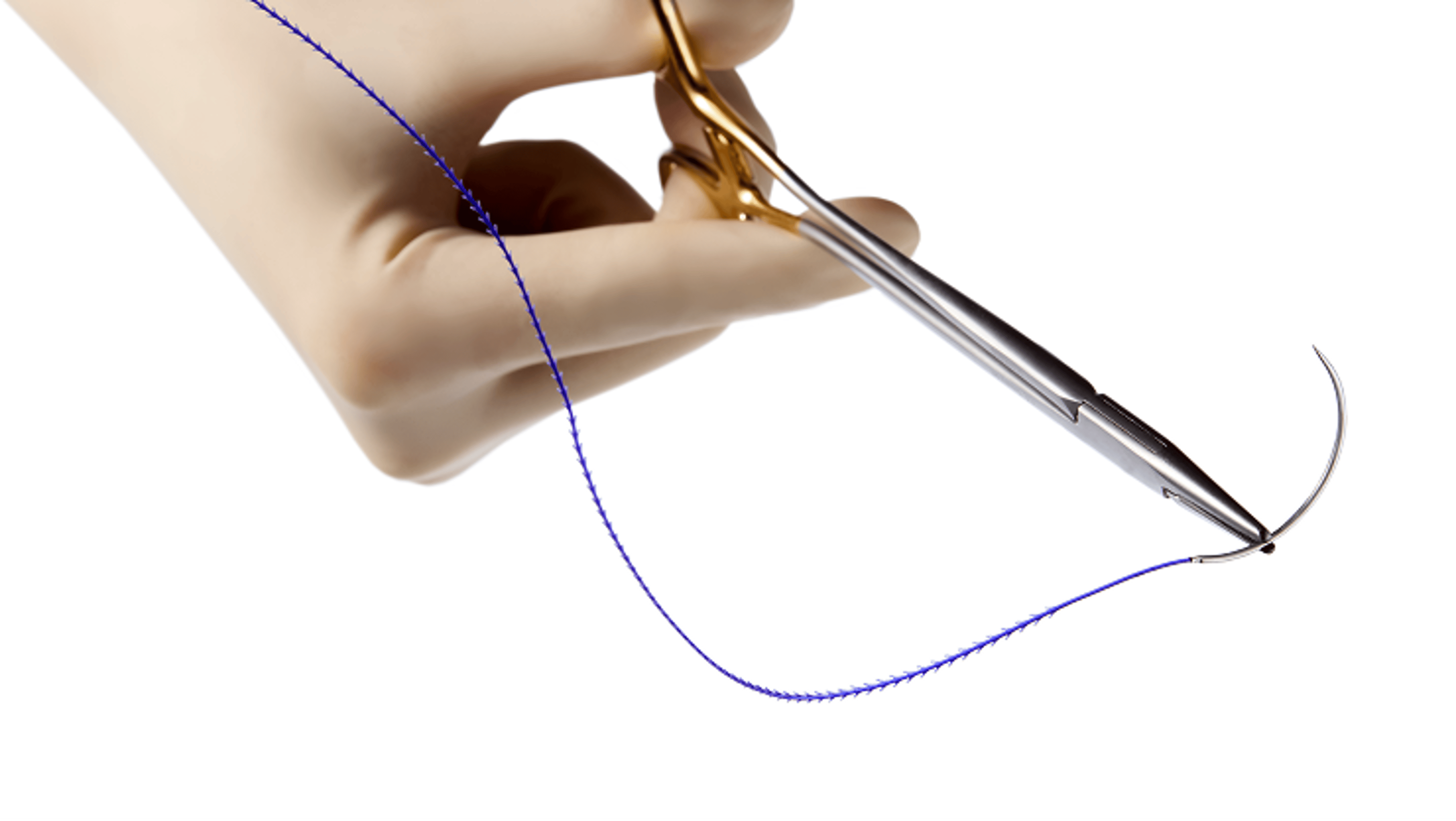 A person holding Johnson & Johnson surgical closure products