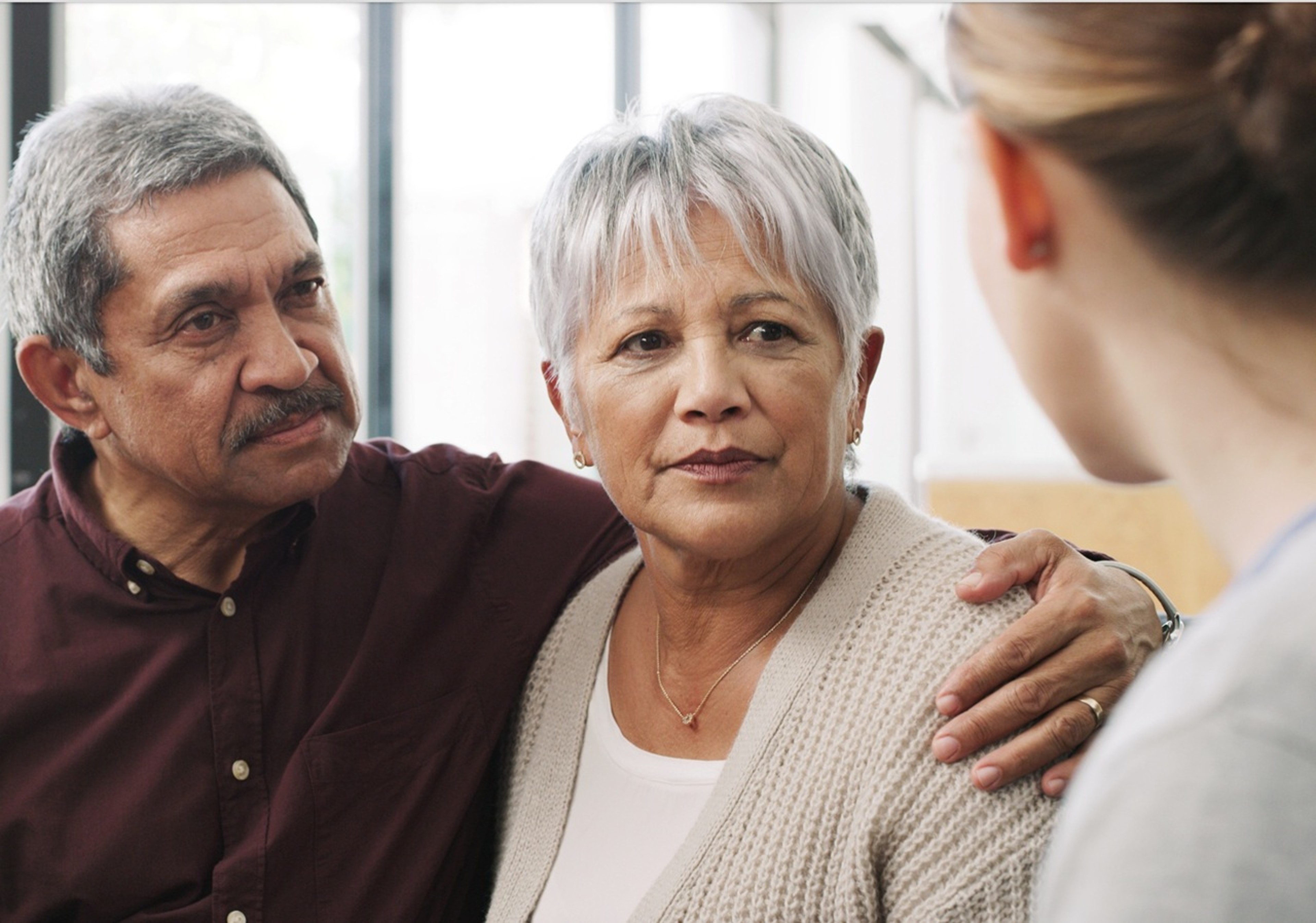 Doctor talking to patients